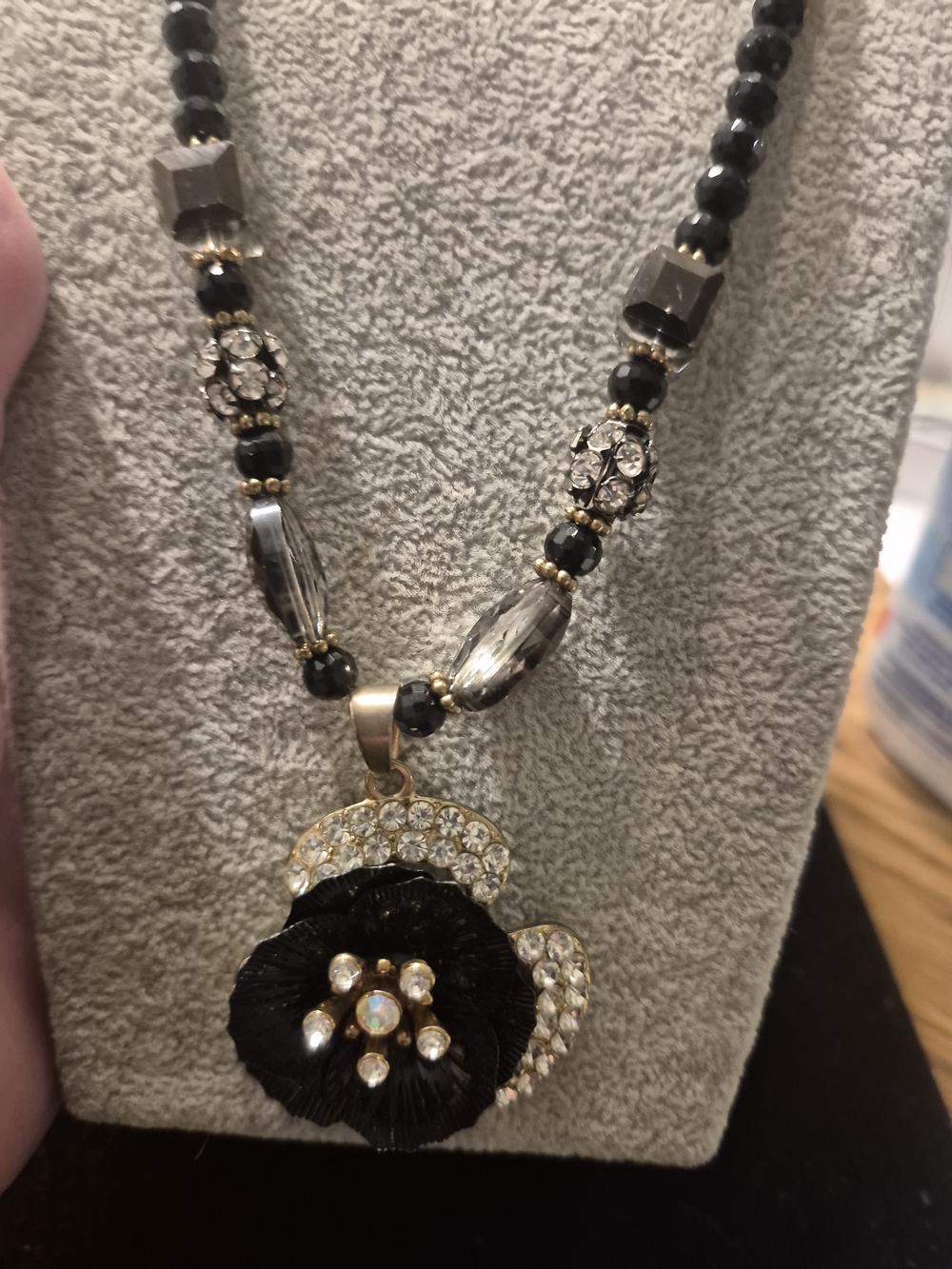 Gold-Tone Black Flower Pendant Necklace with Crystal Accents